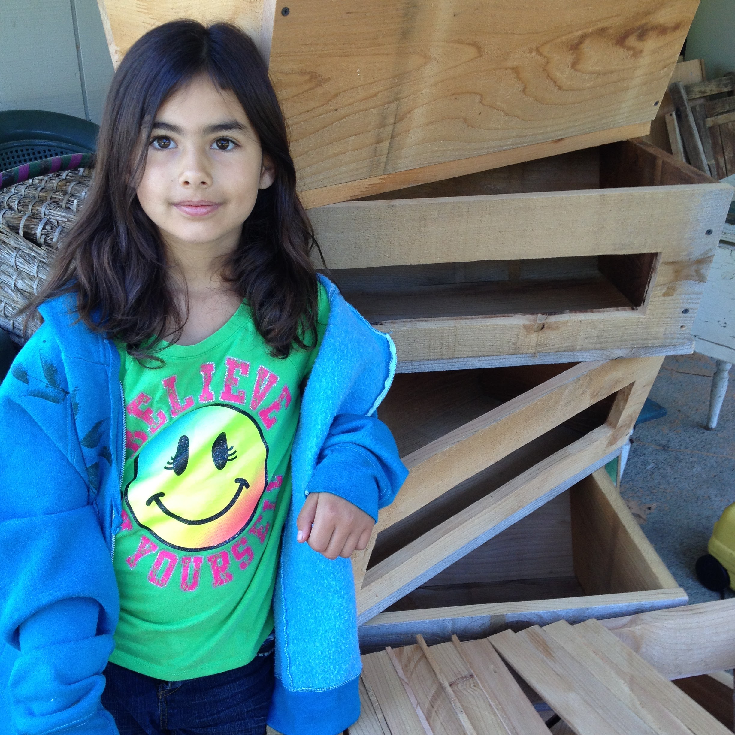Adeline introducing the stack of top bar beehives